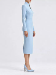 Sky blue stand collar long sleeve midi dress in side profile showing hem slit and heels