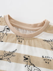 Close-up of the tan ribbed crew neckline on a striped children's dinosaur print T-shirt