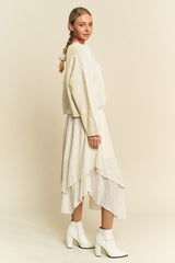 Suéter con hombros caídos y estampado de rombos de Davi & Dani