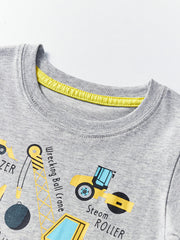 Close-up of the light gray crew neckline with yellow inner trim on a children's construction vehicle T-shirt