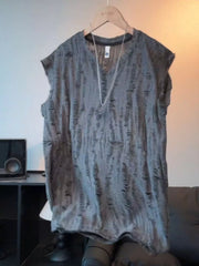 Men's lightweight distressed top with a round neckline and slight stretch.