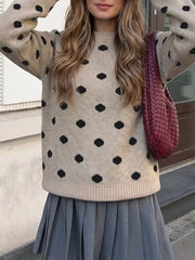 Khaki polka dot dropped shoulder sweater shown front on with arms raised