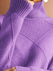 Close up of the lavender ribbed turtleneck and diamond patterned chest