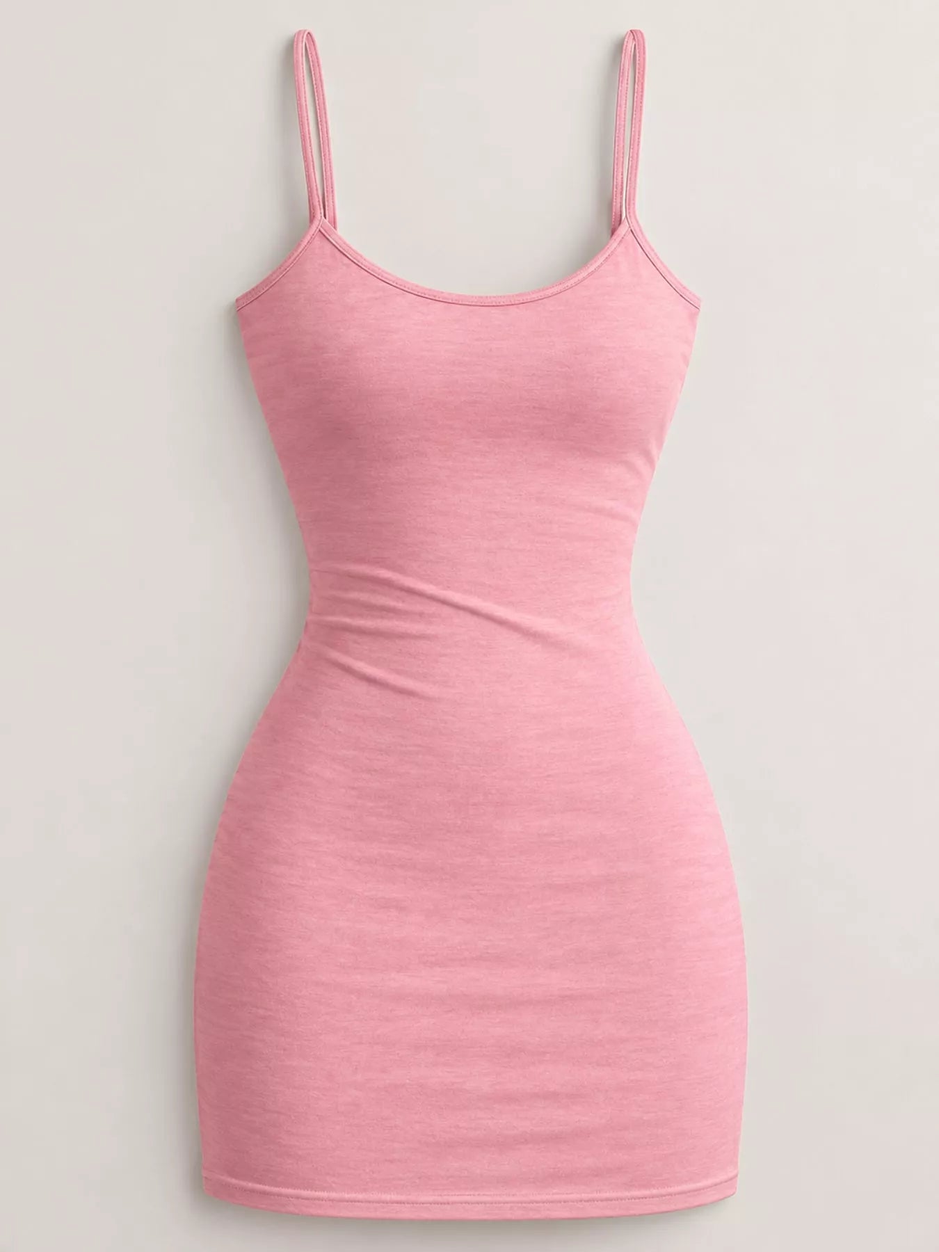 Pink scoop neck cami dress with thin straps, flat front view on plain background