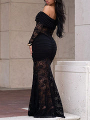 Back side view of black off shoulder ruched maxi dress with lace skirt