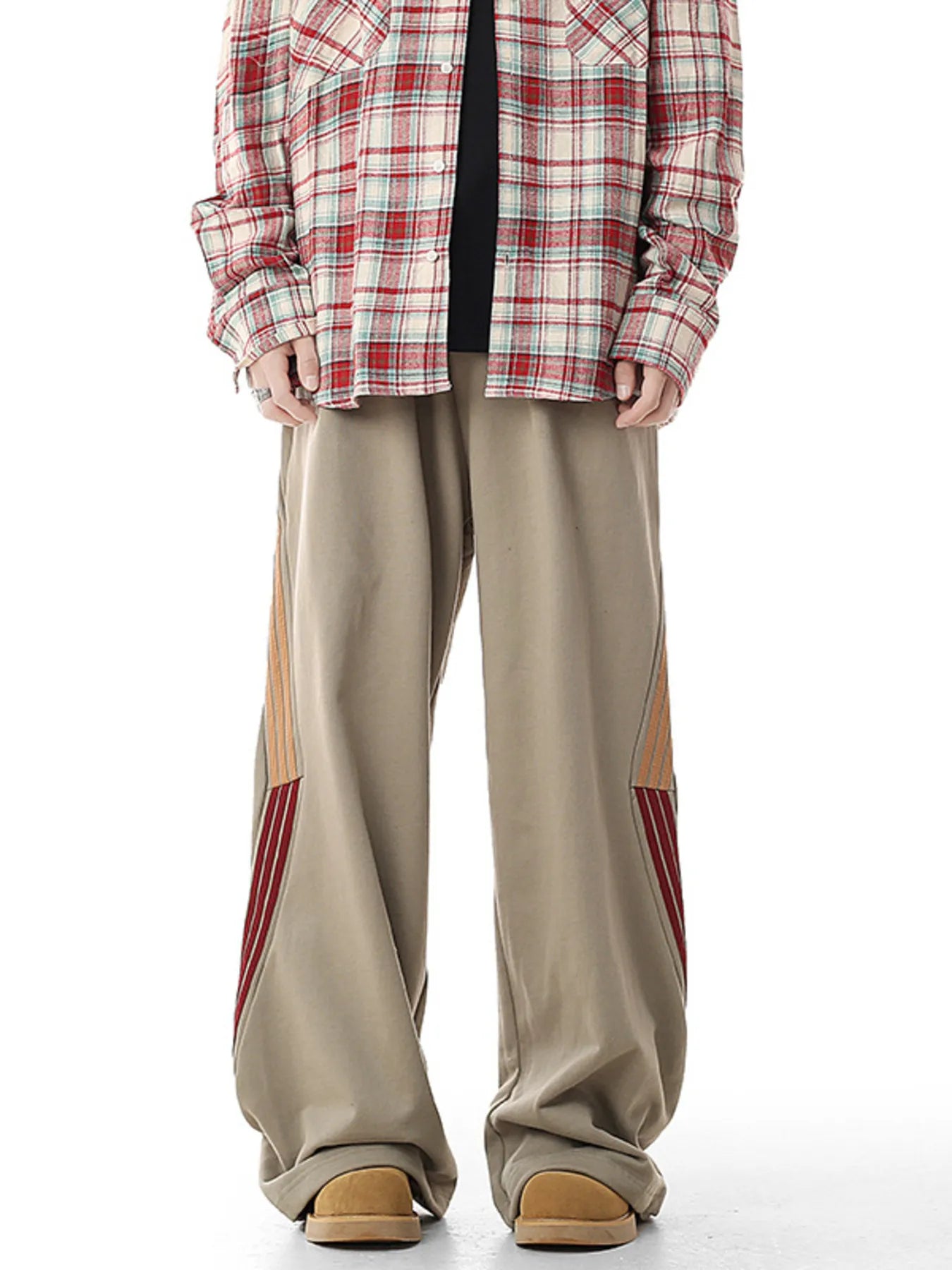 Men's khaki relaxed-fit pants with side stripes and pockets.