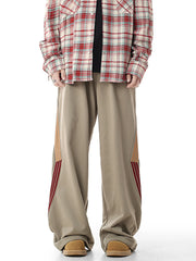 Men's khaki relaxed-fit pants with side stripes and pockets.