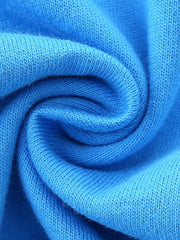 Close up of soft sky blue knitted fabric texture of children's short sleeve t-shirt