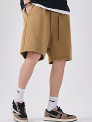 Men's camel casual shorts with a drawstring waist.