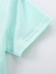 Close-up of mint blue children's short sleeve hem with neat double stitching
