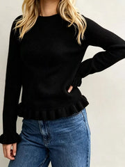 On-model front view of black crew neck sweater with ruffled hem and cuffs