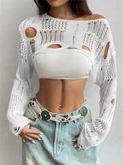 Front view of white distressed open knit cropped cover up with long sleeves.