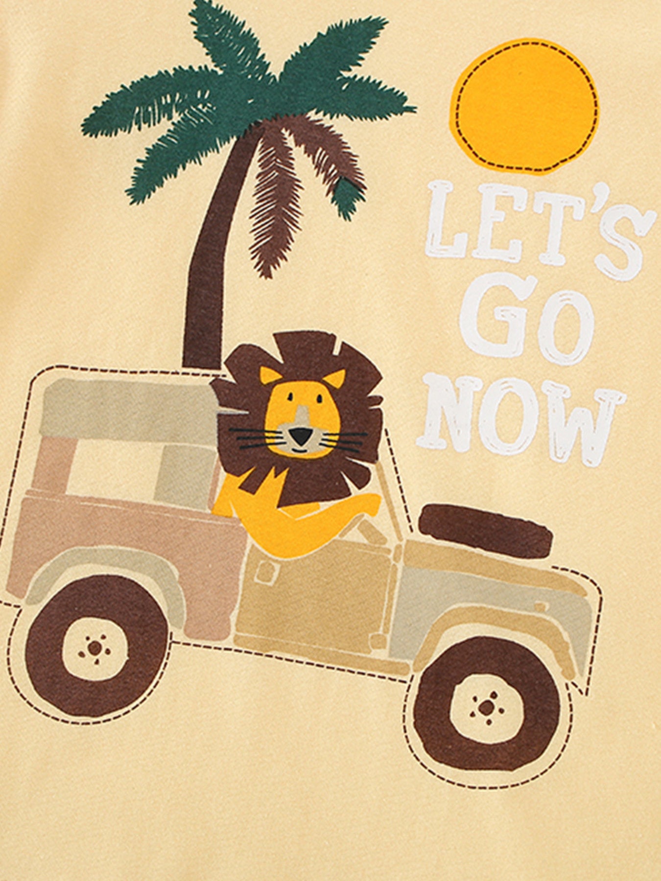 Close-up of the lion driving a safari vehicle graphic on a pastel yellow children's short sleeve T-shirt