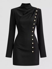 Ghost mannequin front view of black mock neck mini dress with gold decorative buttons and long sleeves