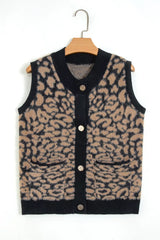 Front view of leopard print knit vest on a hanger, with black trim and pockets.