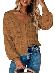 Front view of brown openwork leaf knit cardigan with V neck and button front.
