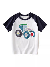 White children's short sleeve T-shirt with navy raglan sleeves laid flat featuring a cartoon tractor