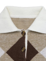 Close-up of the white polo collar and tortoiseshell buttons on the argyle sweater