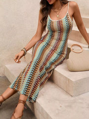 Khaki striped scoop neck bodycon midi dress worn seated on stone steps