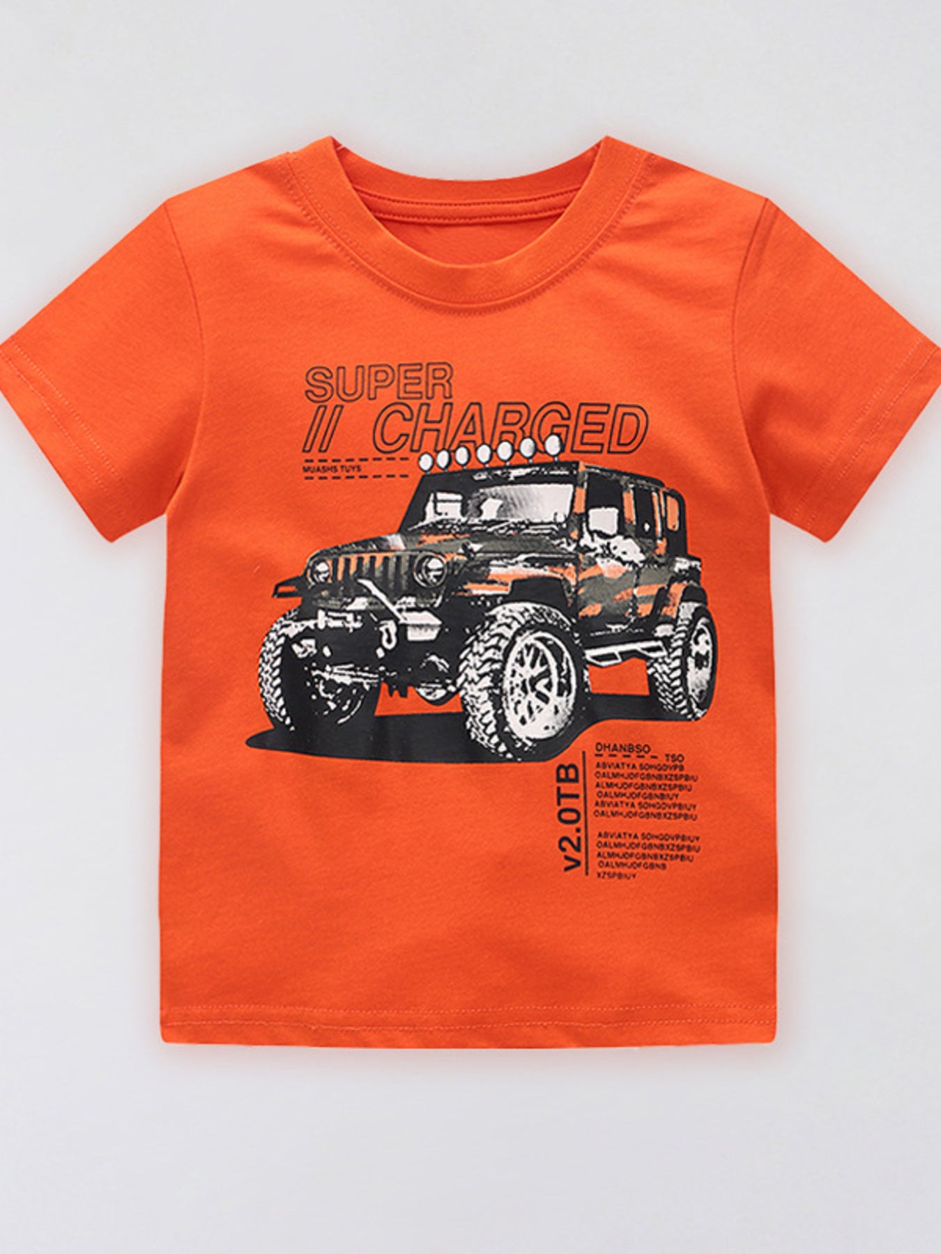 Flat front view of the orange red children's t-shirt with an off road vehicle graphic