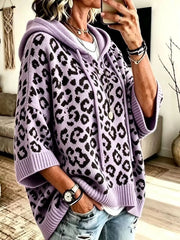 Front angle view of lavender leopard print oversized hooded knit sweater with drawstrings