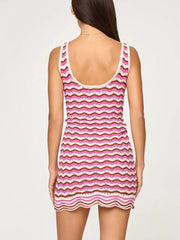 Back view of a pink, cream and brown openwork chevron knit tank dress with a scoop back