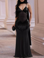Black sequin V neck maxi dress with sheer mesh bodice, front view outdoors
