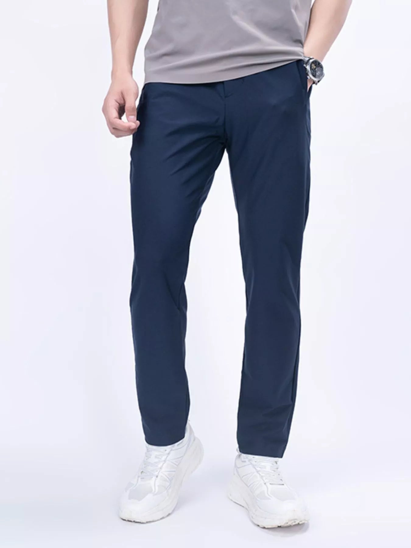 Men's navy slim-fit casual pants with pockets, available in plus sizes.