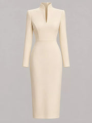 Pale apricot stand collar long sleeve midi dress shown flat from the front