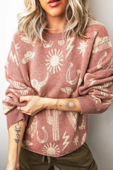 On-model front view of the dusty rose western sweater with arms crossed at the waist