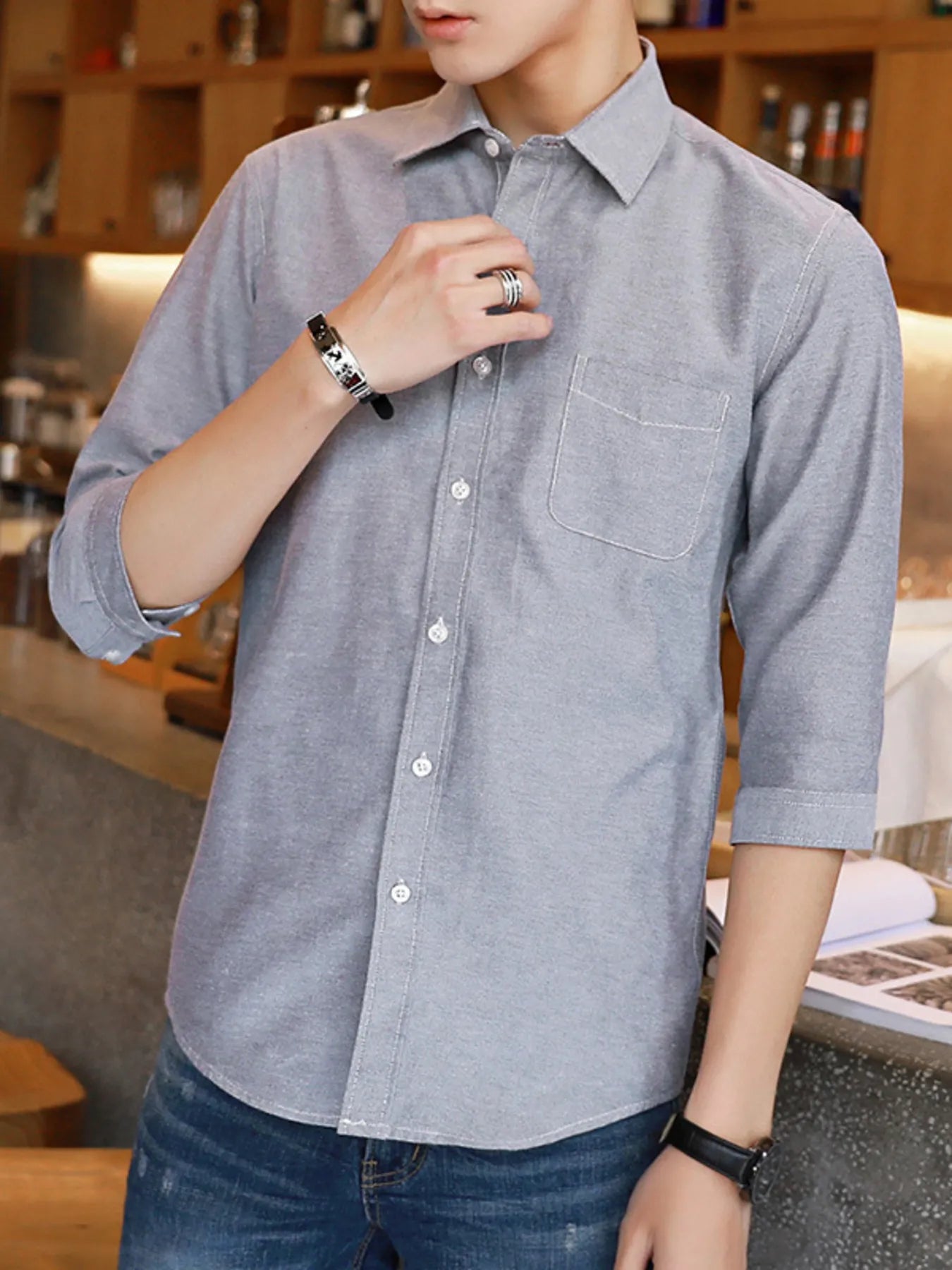 Men's casual button-up shirt made from a cotton-spandex blend.