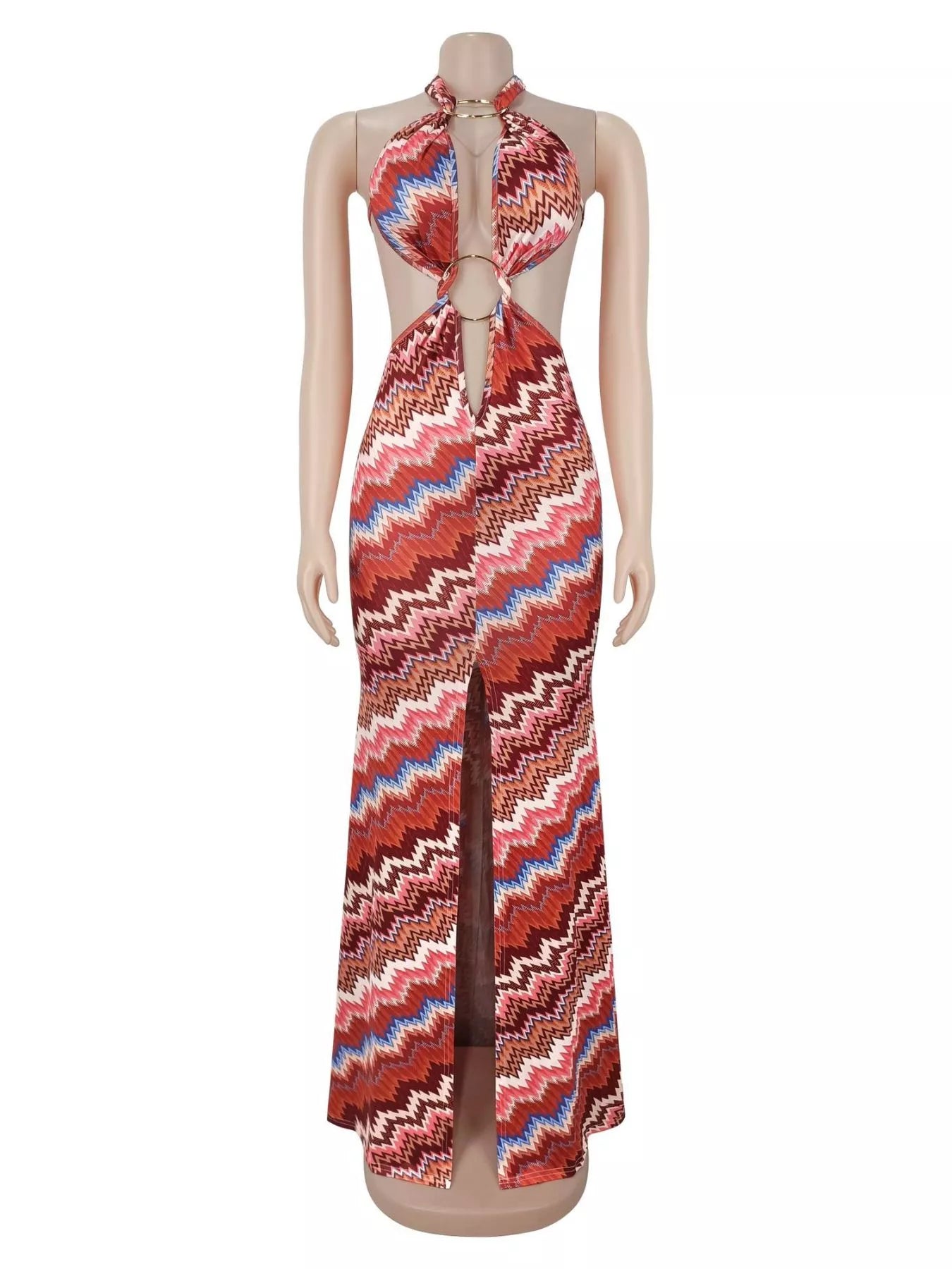 Rust chevron halter maxi dress with ring details and front slit on a mannequin
