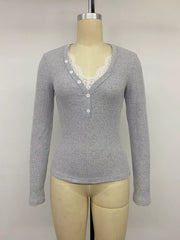 Gray ribbed long-sleeve Henley top with lace-trimmed neckline and button placket on mannequin.