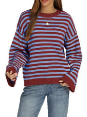 Front view of the red and blue striped sweater with dropped shoulders, long sleeves, and ribbed hem.