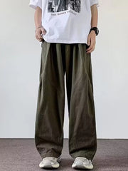 Men's green loose-fit casual cargo pants with a drawstring waist and pockets.