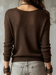 Back view of a plain coffee brown sweater with wide neckline and dropped shoulders