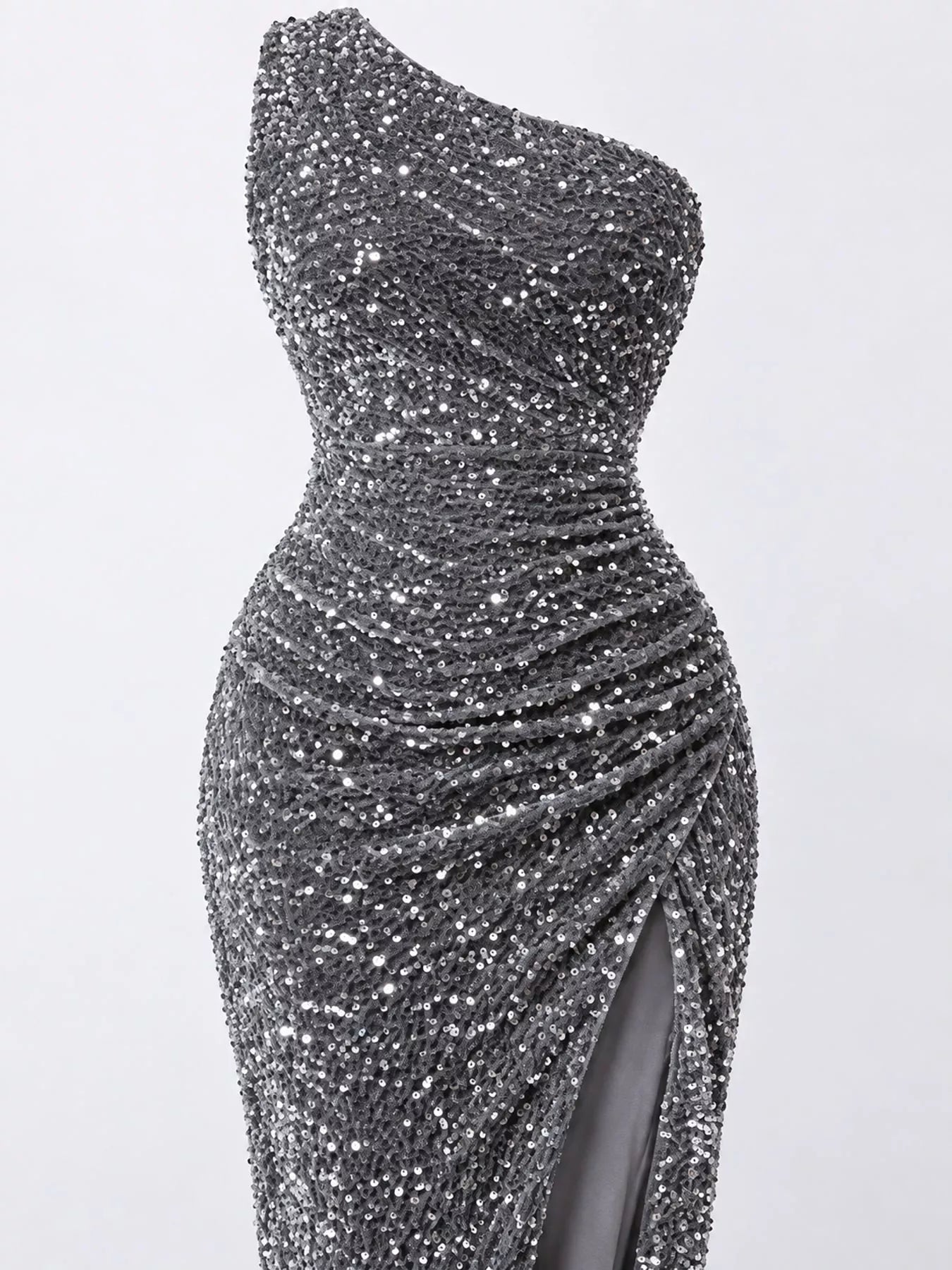 Grey sequin one shoulder evening dress close view showing the ruched waist and sequin texture