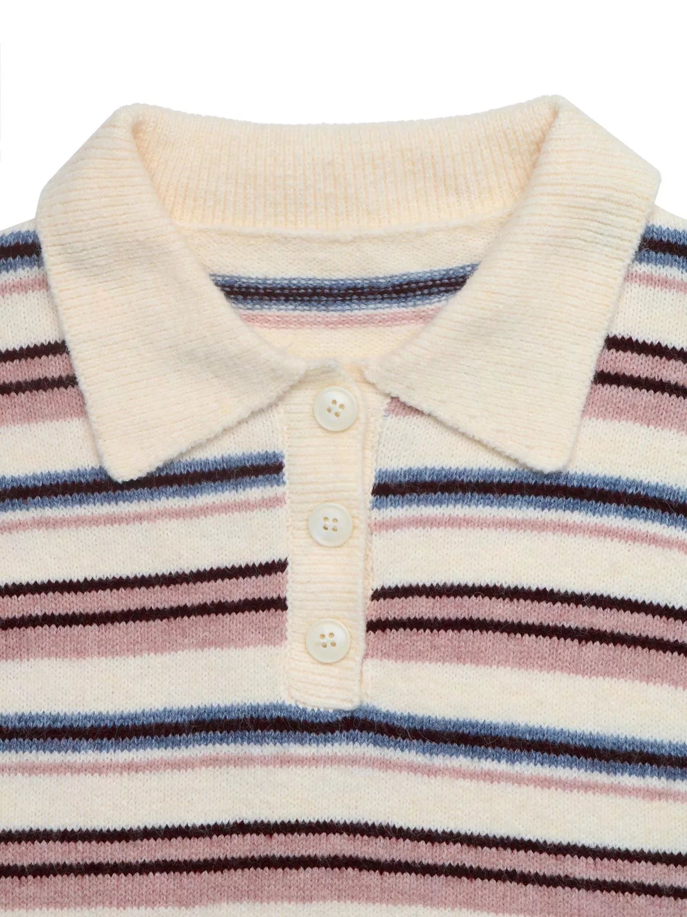 Close-up flat lay of a cream polo collar with three buttons on a striped sweater