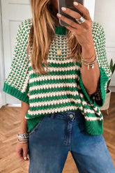 On-model front mirror selfie of green and white striped textured knit sweater with wide short sleeves