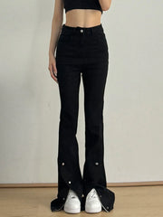 Women's black high-waisted flare jeans with slit detailing and a button-and-zip closure.