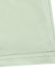 Close view of light green hem stitching on a floral bodycon mermaid maxi dress