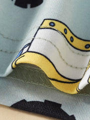 Close-up of the printed sleeve fabric and stitching on the children's construction tee