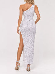 White sequin one shoulder evening dress worn from the back showing the high slit