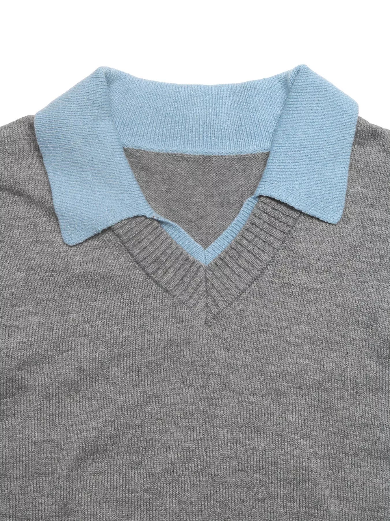 Close up of the light blue polo collar and V neckline on the gray knit sweater