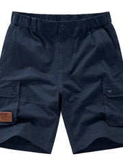 Men's royal blue plus-size shorts with an elastic waist and pockets.