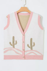 Front view of the cream cactus sweater vest with pink trim hanging on a hanger
