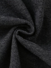 Close up of soft dark gray heathered fabric texture of children's short sleeve t-shirt
