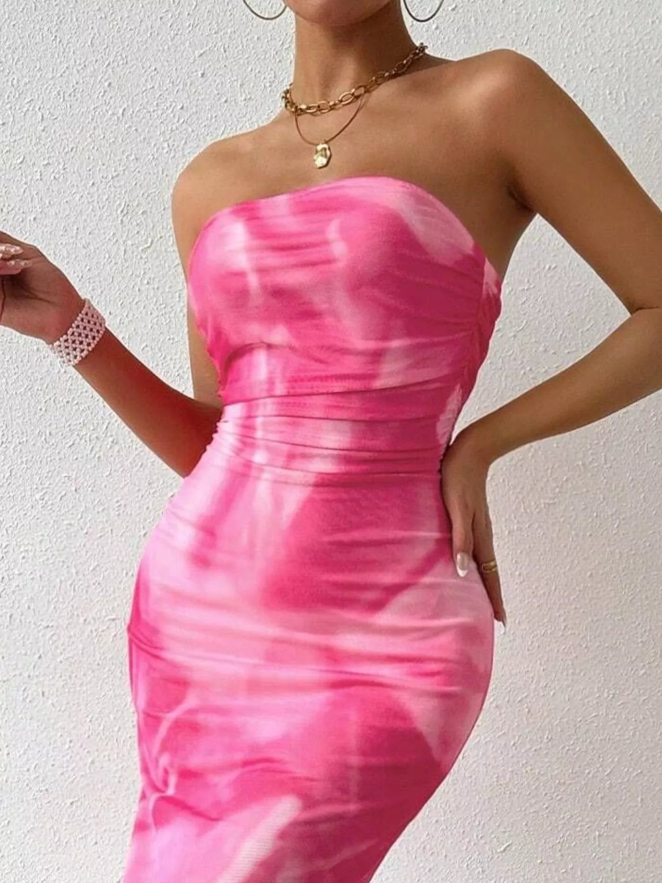 Close bodice view of fuchsia pink tie dye ruched bodycon tube slit dress