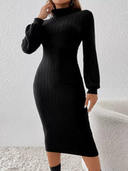 Three quarter front view of a black ribbed knit mock neck bodycon midi dress with balloon sleeves