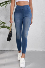 Women's high-waist skinny jeans with pockets and a fitted leg shape.